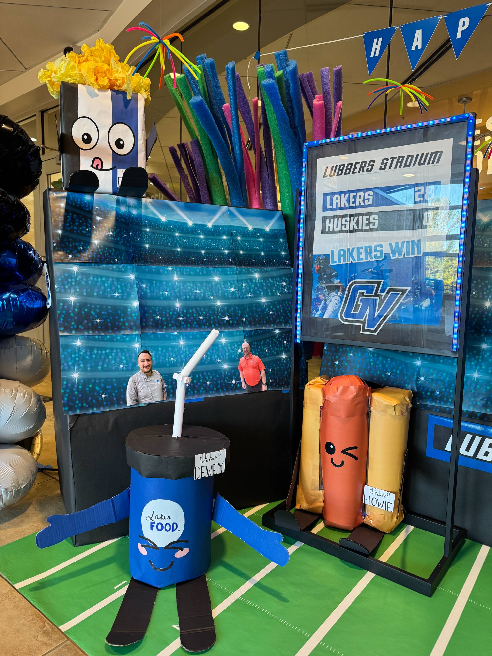 Laker Food Co entrance decorations, hotdog and soda cup